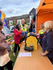 The mayor has a go on the tombola